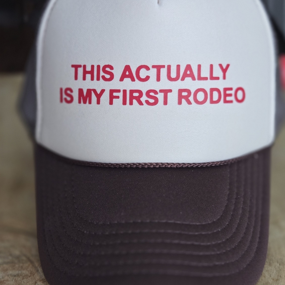 ".. My First Rodeo" Trucker Hat